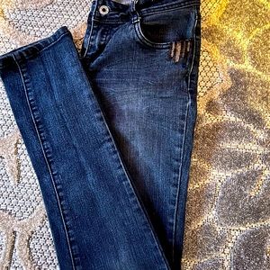 Dark Blue jeans with a hint of a sparkle.